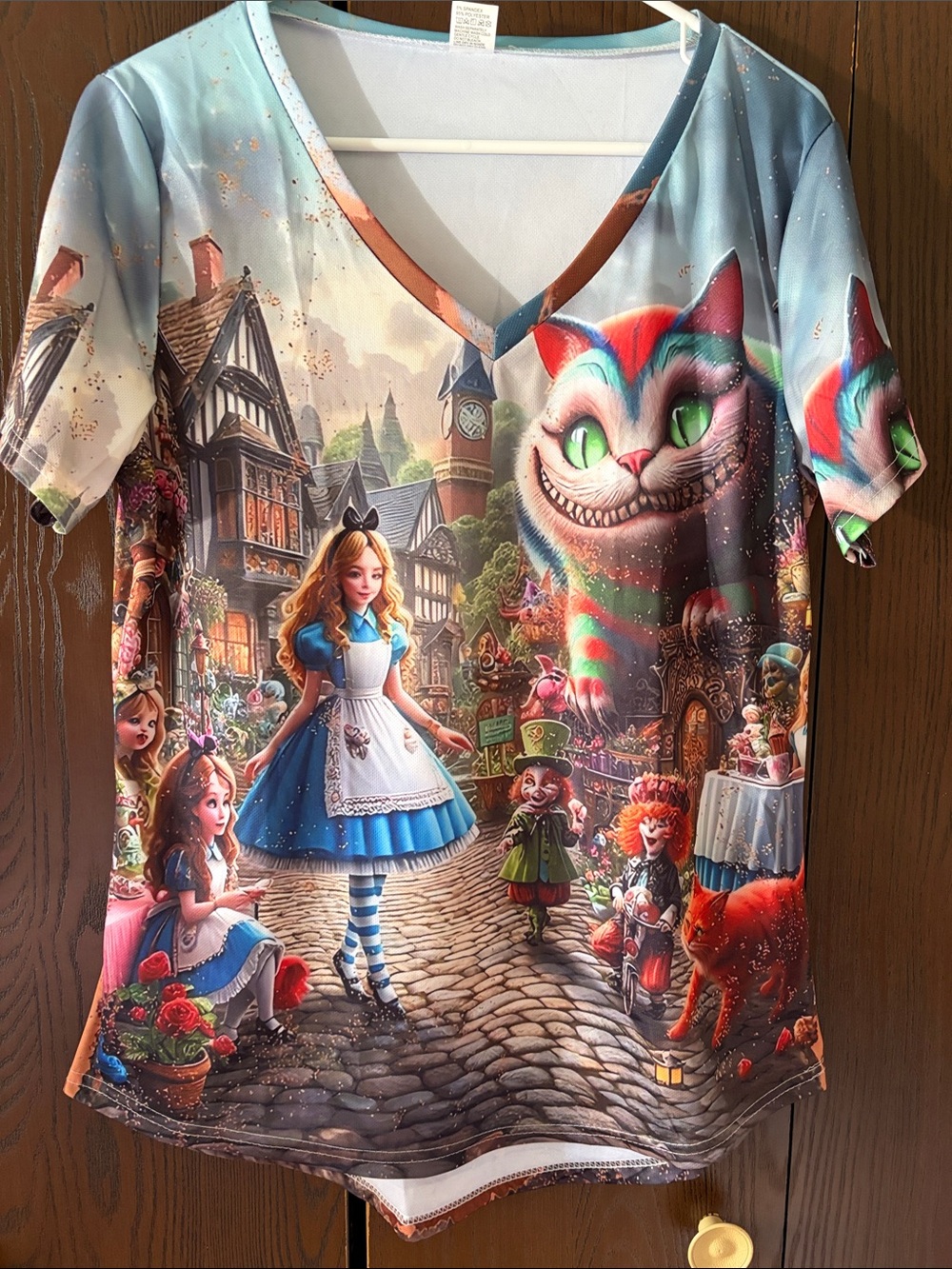No brand women’s Alice in Wonderland Top — Blue & Multicolor. Size Large NWOT